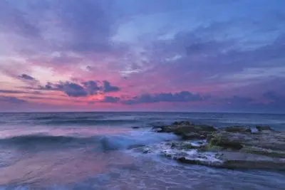 scene with ocean and sky at sunset