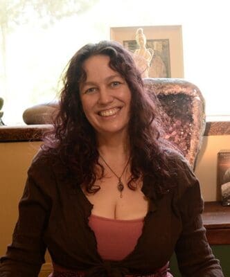 Image of Katie Weatherup. Learn how to raise your vibration with help.
